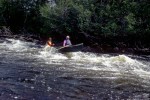 two people in a canoe, nice&nbsp;rapids